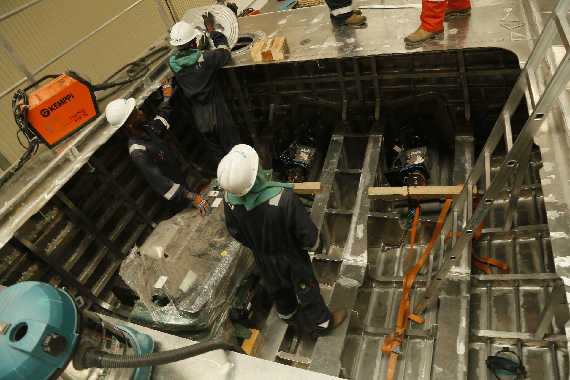 Kianda team fitting out an aluminium vessel interior